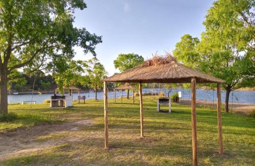 Trapiche Apartment | Cabaña en el lago