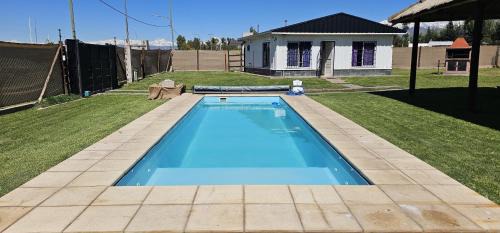 Las Compuertas House | Cabañas con pileta CLIMATIZADA y parque en Mendoza VERDE