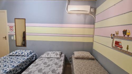Sao Goncalo House | Casa 3 min Shopping Pelotas- Com 1 Suíte, 2 Quartos Climatizados, Piscina e Estacionamento 2 carros