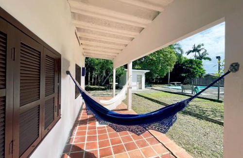 Matinhos House | Casa Ampla de Praia 2 Piscinas e Ar Condicionado