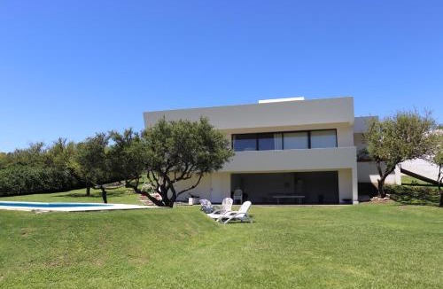 Yocsina House | Casa Carlos Paz en Country Causana