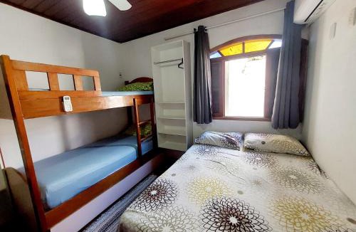 Jardim Nautilus House | Casa com Ar e Varanda Espaçosa em Cabo Frio