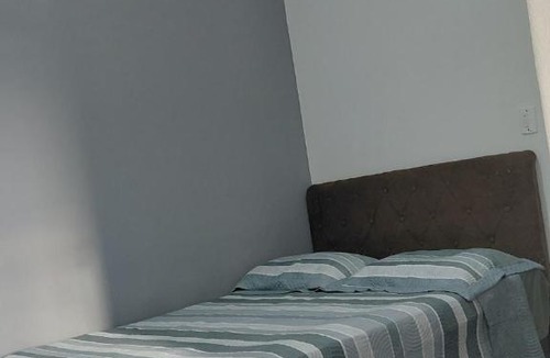 Quietude House | Casa com piscina, ar condicionado, churrasqueira, estacionamento, pet friendly