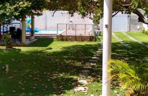 Barra do Jacuipe House | Casa de Praia Arborizada e Ventilada no Condomínio Entre o Encontro do rio e mar