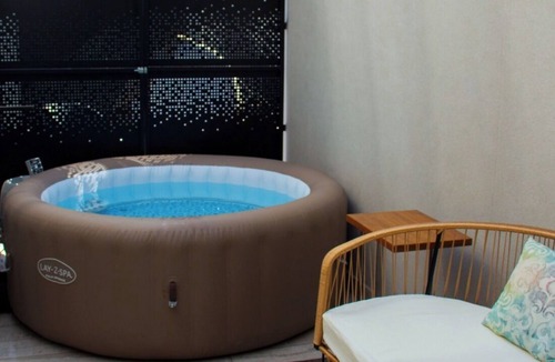 Lujan de Cuyo House | Casamora wine cellar area with Jacuzzi and garden