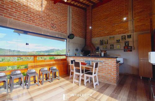 Caldas House | Chácara c/piscina churrasq/forno fogão de lenha