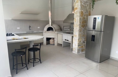 Balneario Guaruja House | Comfortable house with 4 suites in a luxury condominium in Guaruja