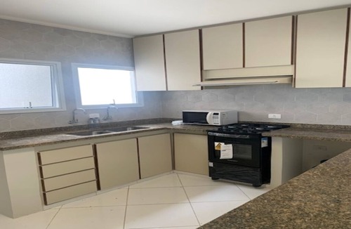 Balneario Guaruja House | Comfortable house with 4 suites in a luxury condominium in Guaruja