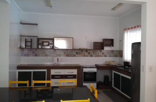 Ilha Comprida House | Conforto Laranja