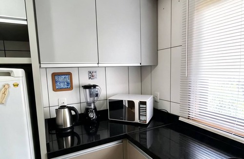 Centro Apartment | Cozy apartment with fireplace, 5 minutes from the Stone Cathedral and 10 minutes from Gramado.