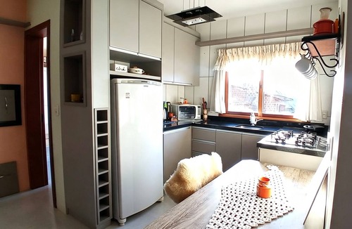 Centro Apartment | Cozy apartment with fireplace, 5 minutes from the Stone Cathedral and 10 minutes from Gramado.