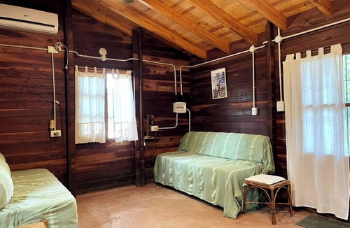 Paso de la Patria Cabin | Cozy wooden cabin in superb Paso de la Patria with WiFi, AC