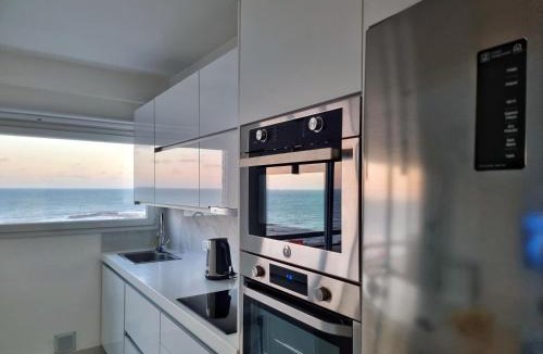 La Perla Apartment | Departamento Pinterest Mar del Plata - Vista plena al mar con cochera