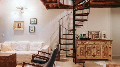 Jardim Europa Apartment | Duplex with fireplace and TV surrounded by nature