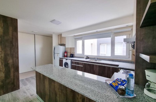 Mercado de la Ciudad Apartment | Edificio Brown
