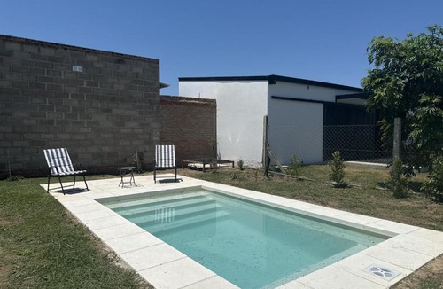 Arroyo Leyes House | Entreverdes, Casas de alquiler - Casa Jacarandá