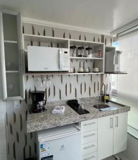 Jardim Flamboyant Apartment | Estúdio luxuoso e aconchegante, com internet, ar condicionado e TV