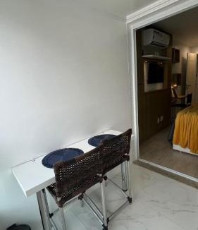 Jardim Flamboyant Apartment | Estúdio luxuoso e aconchegante, com internet, ar condicionado e TV
