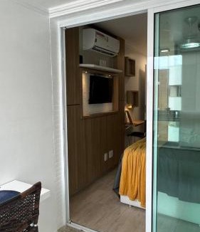 Jardim Flamboyant Apartment | Estúdio luxuoso e aconchegante, com internet, ar condicionado e TV