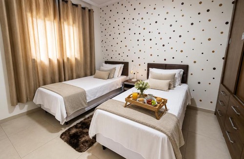 Ourinhos House | Flat 2 quartos em residencial | Ar e garagem