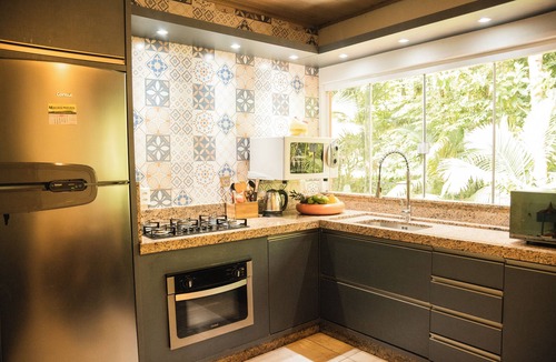 Sao Joao Batista Cottage | Grandma Cida's Corner - A cozy and modern place surrounded by nature.
