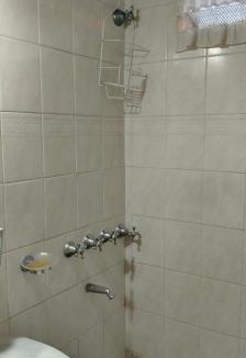 Ramallo Apartment | Habitación con baño para dos personas