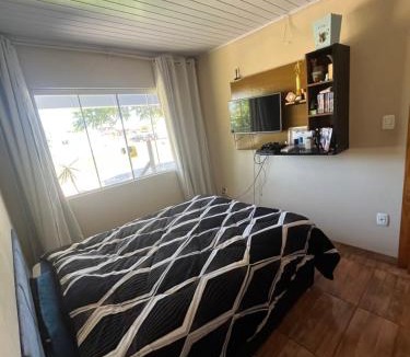Bonfim House | Hospedagem familiar com piscina e churrasqueira