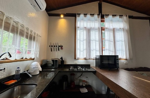 Camburi House | House with Heated Pool in Camburi | River and Nature