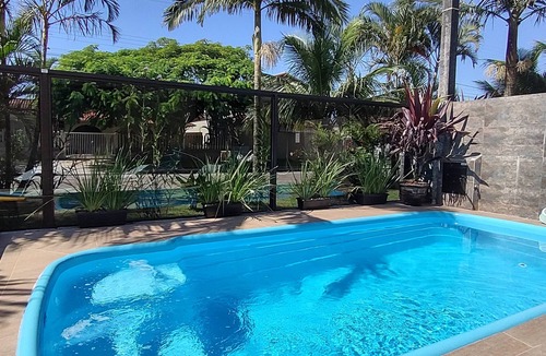 Guaratuba House | Houses with palm trees and swimming pools
