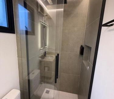 Novo Mundo Apartment | Kalm Stay Refugio com Hidromassagem e Cromoterapia