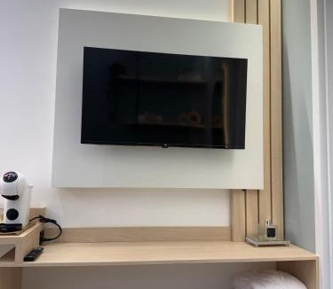 Novo Mundo Apartment | Kalm Stay Refugio com Hidromassagem e Cromoterapia
