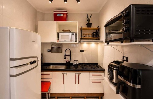 Mirim Apartment | Kitnet na Ocian - 500 metros do mar, Ar condicionado e garagem