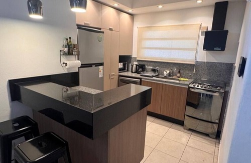 Villa Carlos Paz Apartment | Lodge One overlooking the lake and mountains. An intimate refuge.