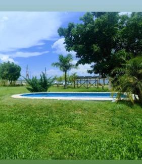 San Cosme House | Luz de Luna Ubicación privilegiada frente a laguna y piscina