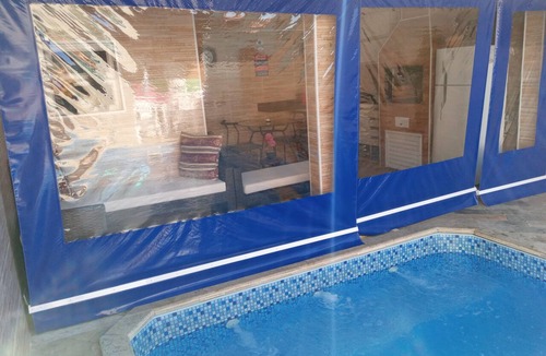 Real House | Modern, comfortable house with a fireplace and heated pool, just 50 meters from the beach