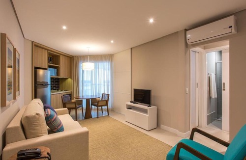 Pompeia Apartment | na praia com vista mar garagem e ar cond inclusos!