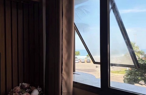 Barra da Tijuca Apartment | Ocean Drive Resort Apartment with Sea View in Barra da Tijuca, Pet Friendly.