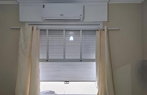 Jardim Vitoria Apartment | One-bedroom apartment five minutes from the beach with parking space