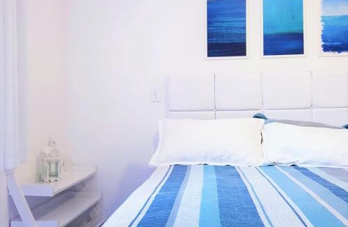 Jardim Centenario Apartment | Paraiso no Guarujá Enseada - Piscina - Ar Condicionado - WIFI - Garagem