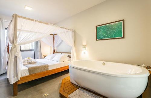 Praia do Rosa Hotel | Pousada Rosa 08 - Piscina aquecida, Café da manhã Gourmet e Suítes com Banheira