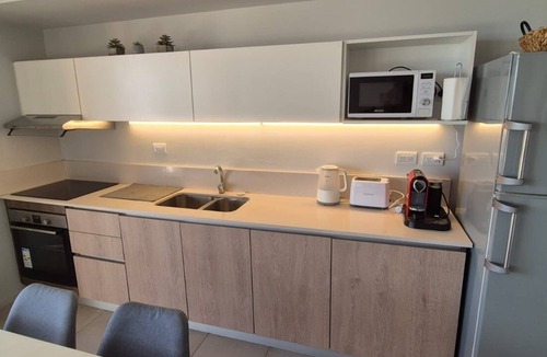 Pinamar Apartment | Premium apartment 2 minutes from the beach, heated swimming pool, spa, fitness center