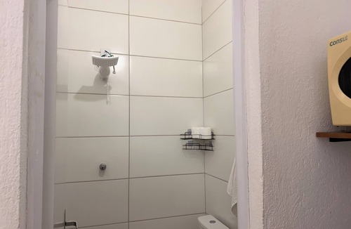 Camargos Apartment | Private studio with TV and private bathroom.
