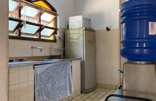 Igarata House | Property with swimming pool, soccer field, Wi-Fi, and a lake with many fish.