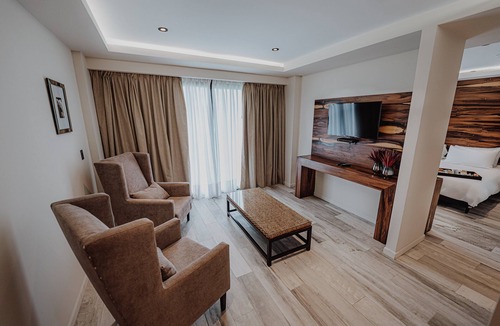 Rio Cuarto Hotel | Relax & Recharge in a Charming Balcony Room Near Green Spaces | Free Breakfast