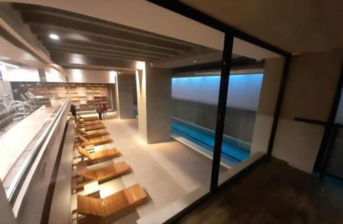 La Perla Apartment | Royal Park,La Perla Wellness con cochera privada, pileta climatizada, amenities full