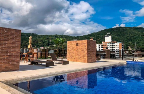 Corrego Grande Apartment | Sapphire Studios: Conforto no Córrego Grande P528