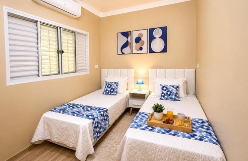 Ourinhos House | Sobrado central | Ar, garagem e Wi-Fi 500Mb