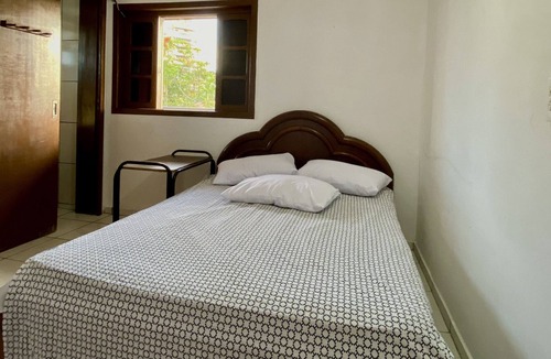 Guaratuba House | Sobrado Terezinha 4.5 blocks from the central beach, WiFi, 2 suites, barbecue, TV,