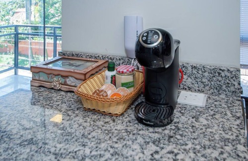 Luque Apartment | Spacious Oasis with Balcony, Kitchen Near Malls