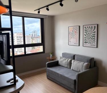 Rio Branco Apartment | Studio moderno, perto de tudo com garagem e ar